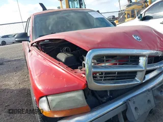 2000 Dodge Dakota Sport with VIN 1B7GL2AN0YS705134, listed as a IAAI auction lot 41997957 with 219,659 mi miles. Bid and sale history available at carsss.com. Image 13.