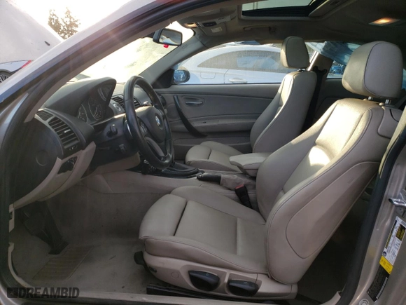 2009 BMW 1 Series 128i SULEV with VIN WBAUP93599VF49074, listed as a Copart auction lot 43756585 with 121,992 mi miles and Salvage Title. Bid and sale history available at carsss.com. Image 7.
