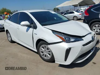 2021 Toyota Prius L Eco with VIN JTDKAMFU8M3135142, listed as a IAAI auction lot 42317007 with 77,353 mi miles and . Bid and sale history available at DreamBid. Image 1.