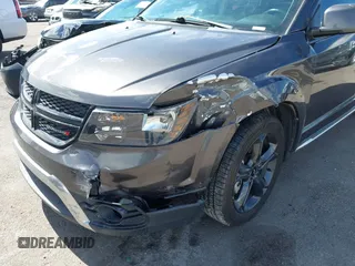 2018 Dodge Journey Crossroad z VIN 3C4PDCGBXJT473775, wystawiony jako IAAI lot #41740081 z przebiegiem 98 286 mil mil oraz . Historia ofert i sprzedaży dostępna na DreamBid. Obrazek 6.