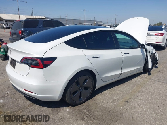 2023 Tesla Model 3 with VIN 5YJ3E1EA0PF621448, listed as a IAAI auction lot 42500155 with 26,589 mi miles and . Bid and sale history available at DreamBid. Image 4.