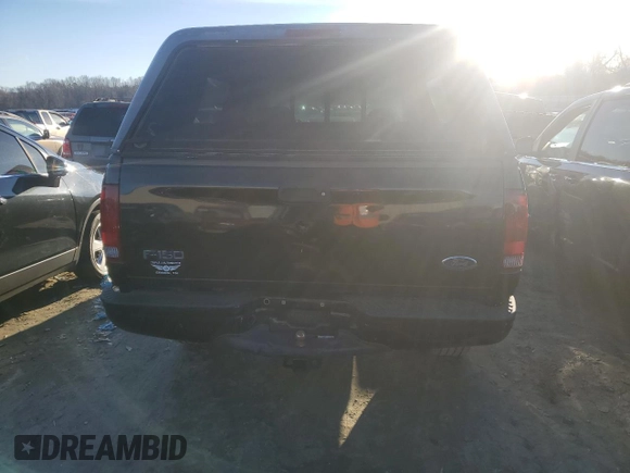 2002 Ford F-150 XL with VIN 1FTRF18232NA58109, listed as a Copart auction lot 88929065 with 148,228 mi miles and Salvage title. Bid and sale history available at DreamBid. Image 6.