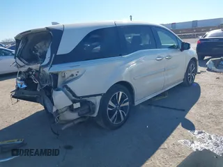 2018 Honda Odyssey Elite with VIN 5FNRL6H94JB065862, listed as a IAAI auction lot 41382127 with 101,774 mi miles and . Bid and sale history available at DreamBid. Image 4.