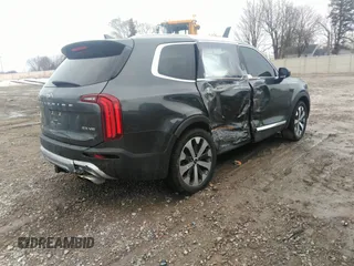 2021 Kia Telluride EX with VIN 5XYP3DHC4MG116989, listed as a IAAI auction lot 41282102 with 58,460 mi miles and . Bid and sale history available at DreamBid. Image 4.