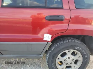 2002 Jeep Grand Cherokee with VIN 1J8GX38S82C176323, listed as a Copart auction lot 78520444 with 206,258 mi miles and Salvage title. Bid and sale history available at DreamBid. Image 13.