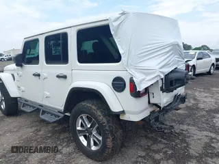 2019 Jeep Wrangler Unlimited Sahara with VIN 1C4HJXEN2KW558851, listed as a IAAI auction lot 42205584 with 175,701 mi miles and . Bid and sale history available at DreamBid. Image 3.