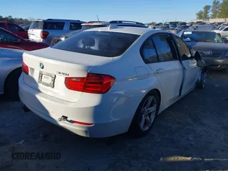 2014 BMW 3 Series 328i with VIN WBA3C1C58EK109865, listed as a IAAI auction lot 41290811 with 146,258 mi miles. Bid and sale history available at carsss.com. Image 4.