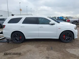 2018 Dodge Durango SRT with VIN 1C4SDJGJ4JC341550, listed as a IAAI auction lot 41525295 with 86,503 mi miles and . Bid and sale history available at DreamBid. Image 14.
