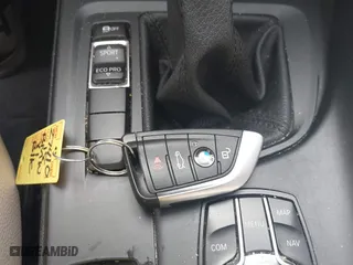 2018 BMW X1 sDrive28i with VIN WBXHU7C39J5L07129, listed as a IAAI auction lot 41472014 with 56,486 mi miles. Bid and sale history available at carsss.com. Image 11.