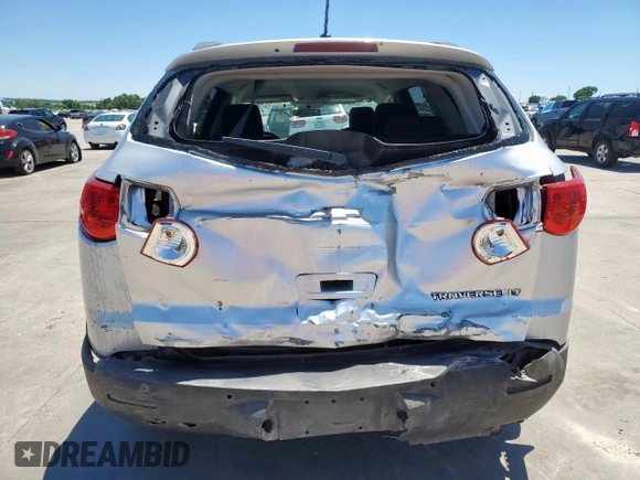 2012 Chevrolet Traverse 1LT z VIN 1GNKVGED5CJ254503, wystawiony jako Copart lot #57509375 z przebiegiem 210 388 mil mil oraz Szkoda całkowita • Salvage title. Historia ofert i sprzedaży dostępna na DreamBid. Obrazek 6.