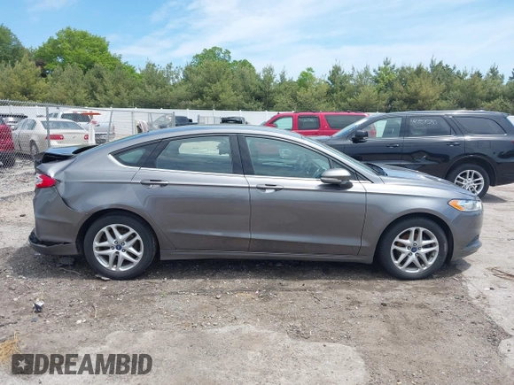 2013 Ford Fusion SE z VIN 3FA6P0H7XDR384789, wystawiony jako IAAI lot #42341339 z przebiegiem 225 418 mil mil oraz . Historia ofert i sprzedaży dostępna na DreamBid. Obrazek 14.