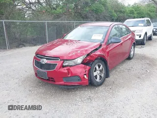 2014 Chevrolet Cruze 1LT with VIN 1G1PC5SB2E7357639, listed as a IAAI auction lot 42129404 with 154,174 mi miles and . Bid and sale history available at DreamBid. Image 2.