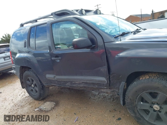 2014 Nissan Xterra X with VIN 5N1AN0NW4EN813172, listed as a IAAI auction lot 42010220 with 185,971 mi miles and . Bid and sale history available at DreamBid. Image 13.