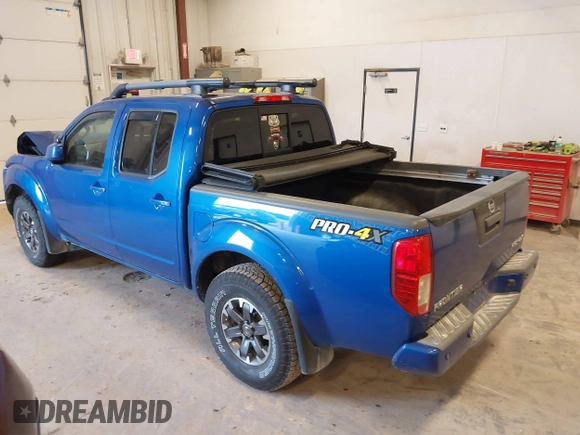 2015 Nissan Frontier SV with VIN 1N6AD0EV4FN709892, listed as a IAAI auction lot 42473594 with 153,103 mi miles and . Bid and sale history available at DreamBid. Image 3.