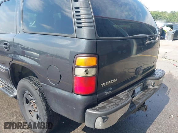 2005 GMC Yukon SLT z VIN 1GKEK13T75J214291, wystawiony jako IAAI lot #42308154 z przebiegiem 286 500 mil mil oraz . Historia ofert i sprzedaży dostępna na DreamBid. Obrazek 12.