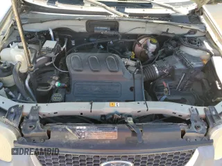 2004 Ford Escape XLT with VIN 1FMYU03104KA53587, listed as a Copart auction lot 51777385 with 154,102 mi miles and Salvage Title. Bid and sale history available at carsss.com. Image 12.