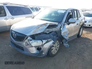 2014 Mazda CX-5 Sport with VIN JM3KE2BE9E0330345, listed as a IAAI auction lot 41377335 with 103,340 mi miles and . Bid and sale history available at carsss.com. Image 2.