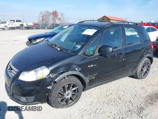 2013 Suzuki SX4 Crossover with VIN JS2YB5A32D6100600, listed as a IAAI auction lot 40667095 with 192,636 mi miles. Bid and sale history available at carsss.com. Image 2.