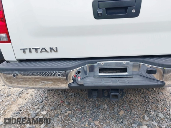 2013 Nissan Titan Pro-4X with VIN 1N6AA0EC7DN312844, listed as a IAAI auction lot 42034411 with Not Provided miles and . Bid and sale history available at DreamBid. Image 6.