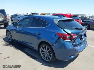 2018 Mazda Mazda3 5-Door Grand Touring with VIN 3MZBN1M31JM201468, listed as a IAAI auction lot 41975539 with 78,438 mi miles. Bid and sale history available at carsss.com. Image 3.