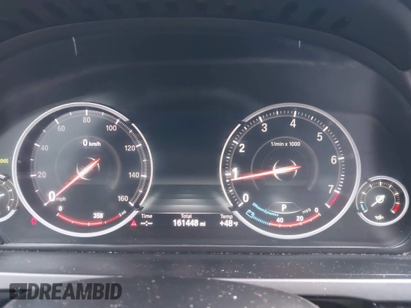 2014 BMW 7 Series 740i with VIN WBAYA6C51ED144387, listed as a IAAI auction lot 41226638 with 161,448 mi miles. Bid and sale history available at carsss.com. Image 7.