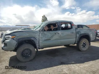 2023 Toyota Tacoma SR with VIN 3TMCZ5AN3PM563612, listed as a Copart auction lot 53995225 with 37,699 mi miles and Salvage title. Bid and sale history available at DreamBid. Image 1.