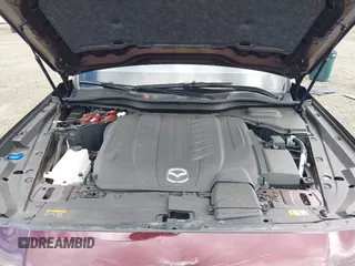 2024 Mazda CX-90 Premium z VIN JM3KKDHD0R1108232, wystawiony jako IAAI lot #42224398 z przebiegiem 3 934 mil mil oraz . Historia ofert i sprzedaży dostępna na DreamBid. Obrazek 10.
