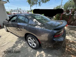 2019 Dodge Charger SXT with VIN 2C3CDXBG0KH655072, listed as a Copart auction lot 54632395 with 52,549 mi miles and Salvage Title. Bid and sale history available at carsss.com. Image 3.