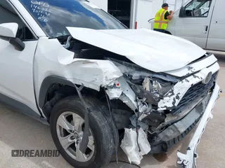 2019 Toyota RAV4 XLE with VIN 2T3W1RFVXKW033696, listed as a IAAI auction lot 42044151 with 126,872 mi miles and . Bid and sale history available at DreamBid. Image 6.