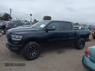 2019 Ram 1500 Big Horn z VIN 1C6RREFT4KN769609, wystawiony jako IAAI lot #42401229 z przebiegiem 46 049 mil mil oraz . Historia ofert i sprzedaży dostępna na DreamBid. Obrazek 15.