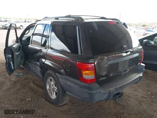 2004 Jeep Grand Cherokee Laredo with VIN 1J4GX48N64C436853, listed as a IAAI auction lot 41785918 with 118,578 mi miles. Bid and sale history available at carsss.com. Image 3.