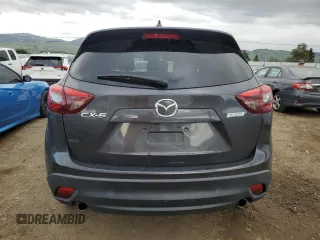 2016 Mazda CX-5 Grand Touring with VIN JM3KE2DY4G0795271, listed as a Copart auction lot 50986845 with 92,323 mi miles and Salvage Title. Bid and sale history available at carsss.com. Image 6.