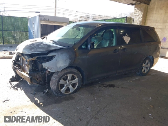 2011 Toyota Sienna with VIN 5TDZK3DC0BS075319, listed as a IAAI auction lot 41458855 with 211,583 mi miles. Bid and sale history available at carsss.com. Image 2.