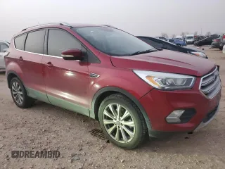 2017 Ford Escape Titanium with VIN 1FMCU0J99HUB42779, listed as a Copart auction lot 47860945 with 98,114 mi miles and Salvage Title. Bid and sale history available at carsss.com. Image 4.