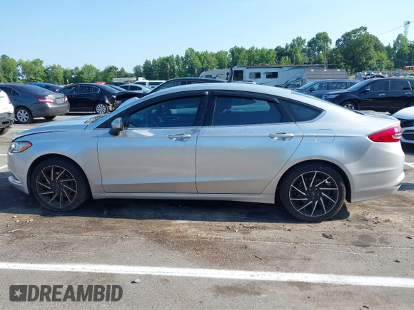2017 Ford Fusion SE with VIN 3FA6P0HD4HR363657, listed as a IAAI auction lot 42647734 with 95,867 mi miles and . Bid and sale history available at DreamBid. Image 13.