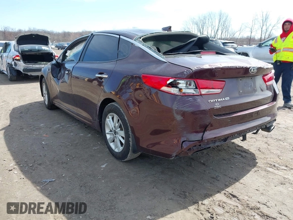 2018 Kia Optima LX with VIN 5XXGT4L33JG207050, listed as a IAAI auction lot 41857645 with 143,707 mi miles and . Bid and sale history available at DreamBid. Image 3.