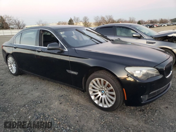 2012 BMW 7 Series with VIN WBAKX8C52CC198431, listed as a Copart auction lot 87894075 with 72,818 mi miles and Clean title. Bid and sale history available at DreamBid. Image 4.