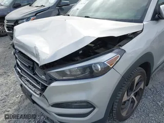 2018 Hyundai Tucson Value with VIN KM8J3CA21JU816783, listed as a IAAI auction lot 41716795 with 84,580 mi miles. Bid and sale history available at carsss.com. Image 6.