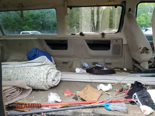 2006 Ford Econoline Passenger XL with VIN 1FBNE31L56HA16906, listed as a Copart auction lot 55937755 with 216,416 mi miles and Salvage title. Bid and sale history available at DreamBid. Image 11.