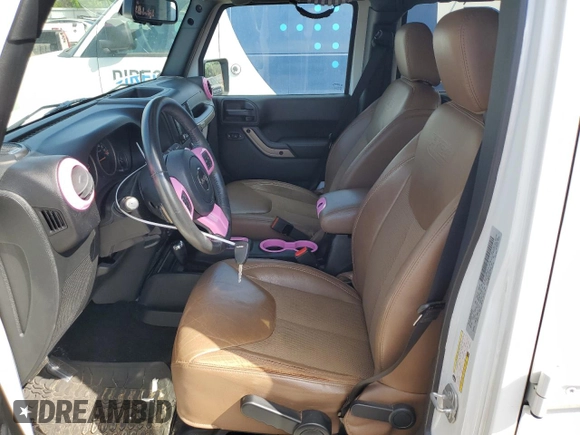 2016 Jeep Wrangler Unlimited Sahara with VIN 1C4BJWEG1GL328101, listed as a Copart auction lot 52754865 with 65,106 mi miles and Salvage title. Bid and sale history available at DreamBid. Image 7.