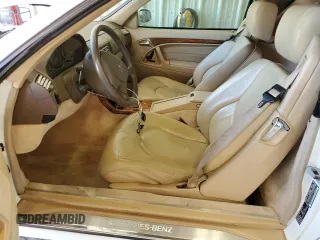 1999 Mercedes-Benz SL-Class with VIN WDBFA68F2XF179134, listed as a Copart auction lot 67335014 with 68,406 mi miles and Clean Title. Bid and sale history available at carsss.com. Image 7.