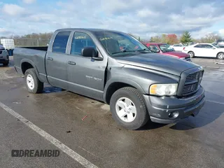 2002 Dodge 1500 z VIN 3D7HA18N92G174434, wystawiony jako IAAI lot #42080615 z przebiegiem 121 020 mil mil oraz . Historia ofert i sprzedaży dostępna na DreamBid. Obrazek 1.