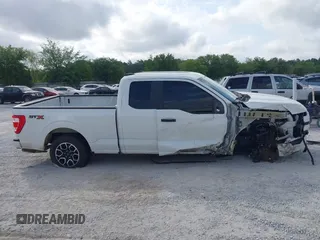 2023 Ford F-150 XL with VIN 1FTEX1CP9PKF91606, listed as a IAAI auction lot 42124058 with 23,535 mi miles and . Bid and sale history available at DreamBid. Image 13.