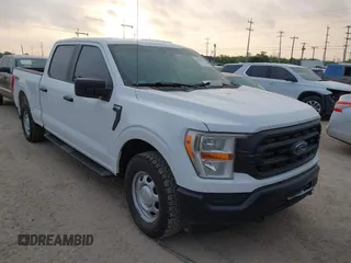 2022 Ford F-150 XL with VIN 1FTFW1E51NKE67183, listed as a IAAI auction lot 42123925 with 100,877 mi miles. Bid and sale history available at carsss.com. Image 1.