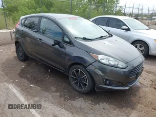 2016 Ford Fiesta SE z VIN 3FADP4EJ2GM183629, wystawiony jako IAAI lot #42193199 z przebiegiem 80 653 mil mil oraz . Historia ofert i sprzedaży dostępna na DreamBid. Obrazek 1.