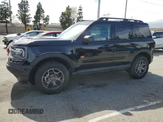 2023 Ford Bronco Sport Badlands z VIN 3FMCR9D97PRD35830, wystawiony jako Copart lot #56950865 z przebiegiem 7401 mil mil oraz Szkody całkowita. Historia ofert i sprzedaży dostępna na DreamBid. Obrazek 1.