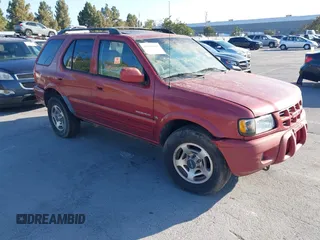 2001 Isuzu Rodeo S with VIN 4S2DM58W814303358, listed as a IAAI auction lot 42695509 with Not provided miles and . Bid and sale history available at DreamBid. Image 1.