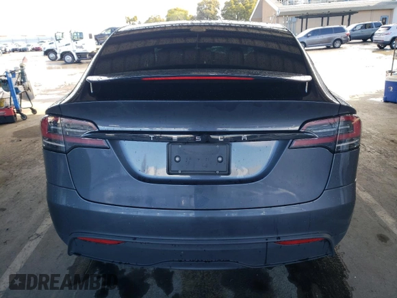 2023 Tesla Model X with VIN 7SAXCDE55PF410146, listed as a Copart auction lot 48818085 with 26,494 mi miles and Salvage Title. Bid and sale history available at DreamBid. Image 6.