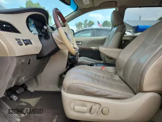 2011 Toyota Sienna XLE AAS with VIN 5TDYK3DC5BS081015, listed as a Copart auction lot 61096595 with 291,855 mi miles and Salvage title. Bid and sale history available at DreamBid. Image 7.