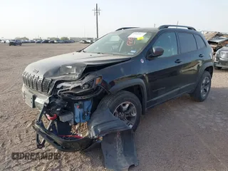 2019 Jeep Cherokee Trailhawk Elite with VIN 1C4PJMBX4KD385796, listed as a IAAI auction lot 41557577 with 55,700 mi miles. Bid and sale history available at carsss.com. Image 2.